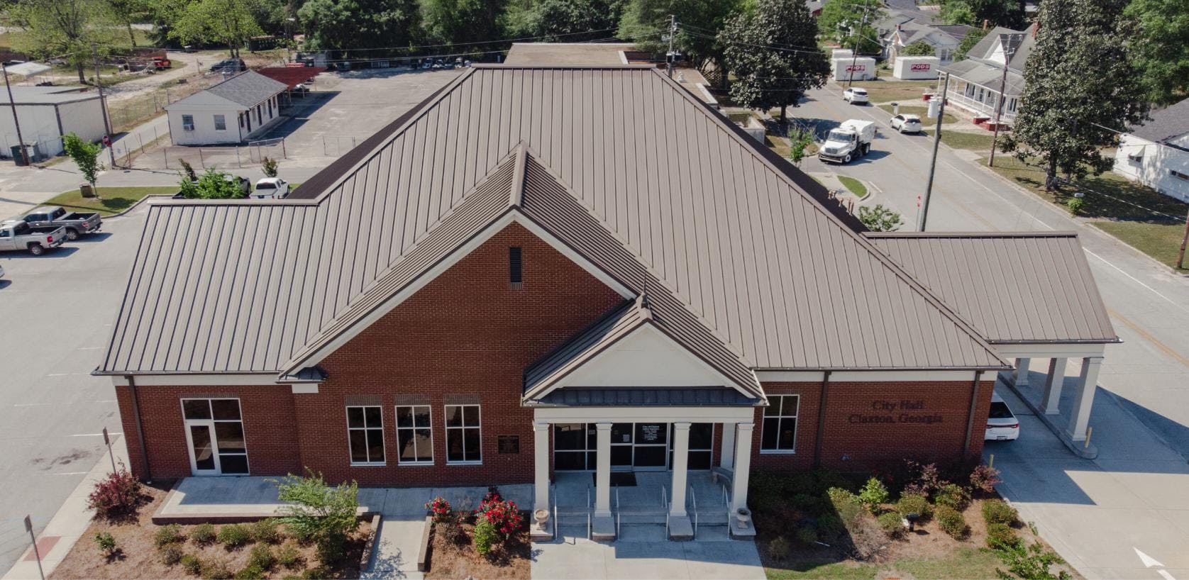 Claxton City Hall Roof | Medium Bronze Standing Seam Metal Roofing | Evans County Commercial Roofers | Commercial Roof Replacement
