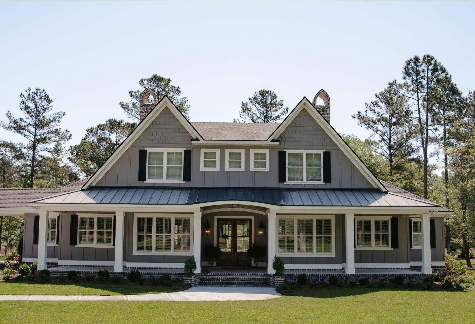 Home With Architectural Asphalt Shingles & Standing Seam Metal Roofing | Mixed Material Roofing | Bulloch County Residential Roofing | Statesboro Residential Roofers