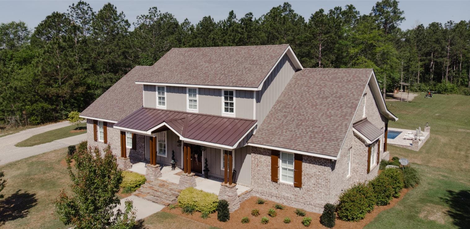 Home With Architectural Asphalt Shingles & Standing Seam Metal Roofing | Mixed Material Roofing | Bulloch County Residential Roofing | Statesboro Residential Roofers