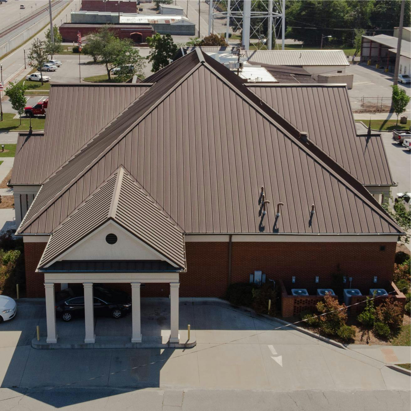 Claxton City Hall Roof | Medium Bronze Standing Seam Metal Roofing | Evans County Commercial Roofers | Commercial Roof Replacement