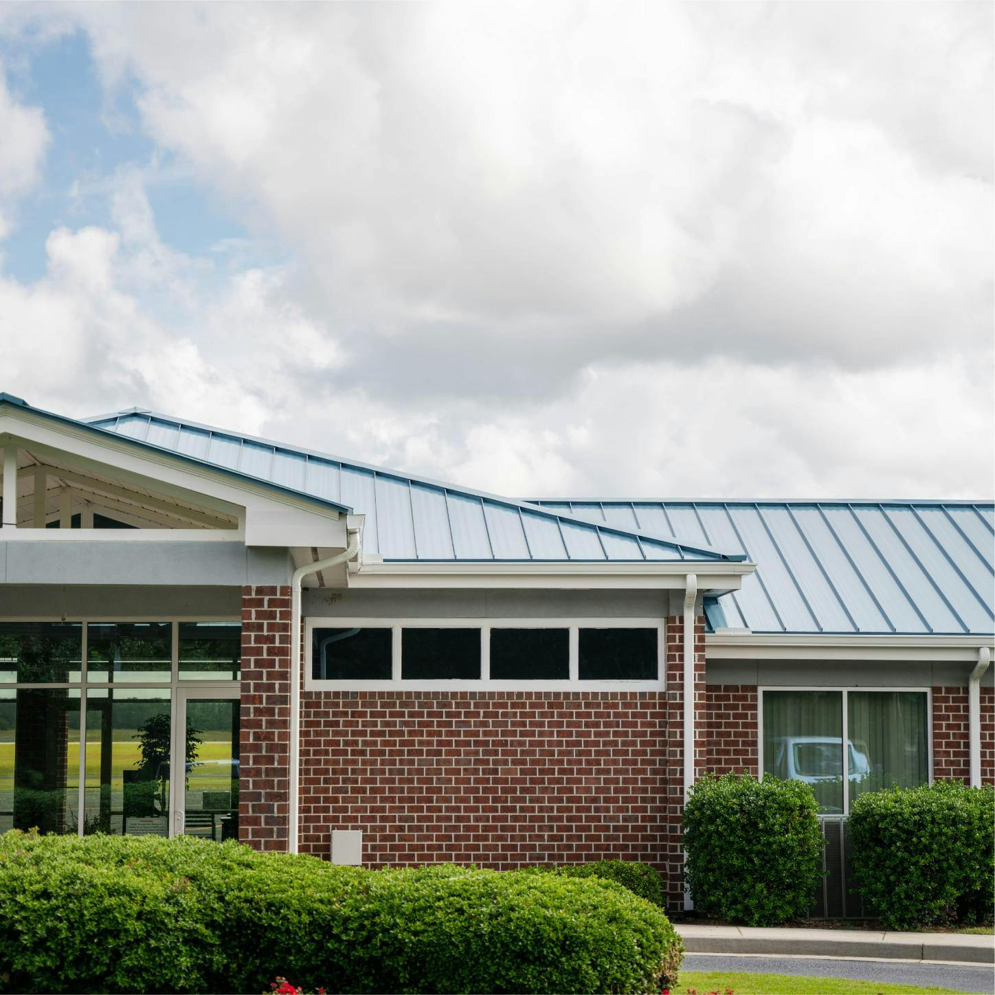 Statesboro-Bulloch County Airport | Commercial Roof Replacement | Bulloch County Commercial Roofers | Standing Seam Metal Roofing | Blue Roof | Commercial Metal Roof