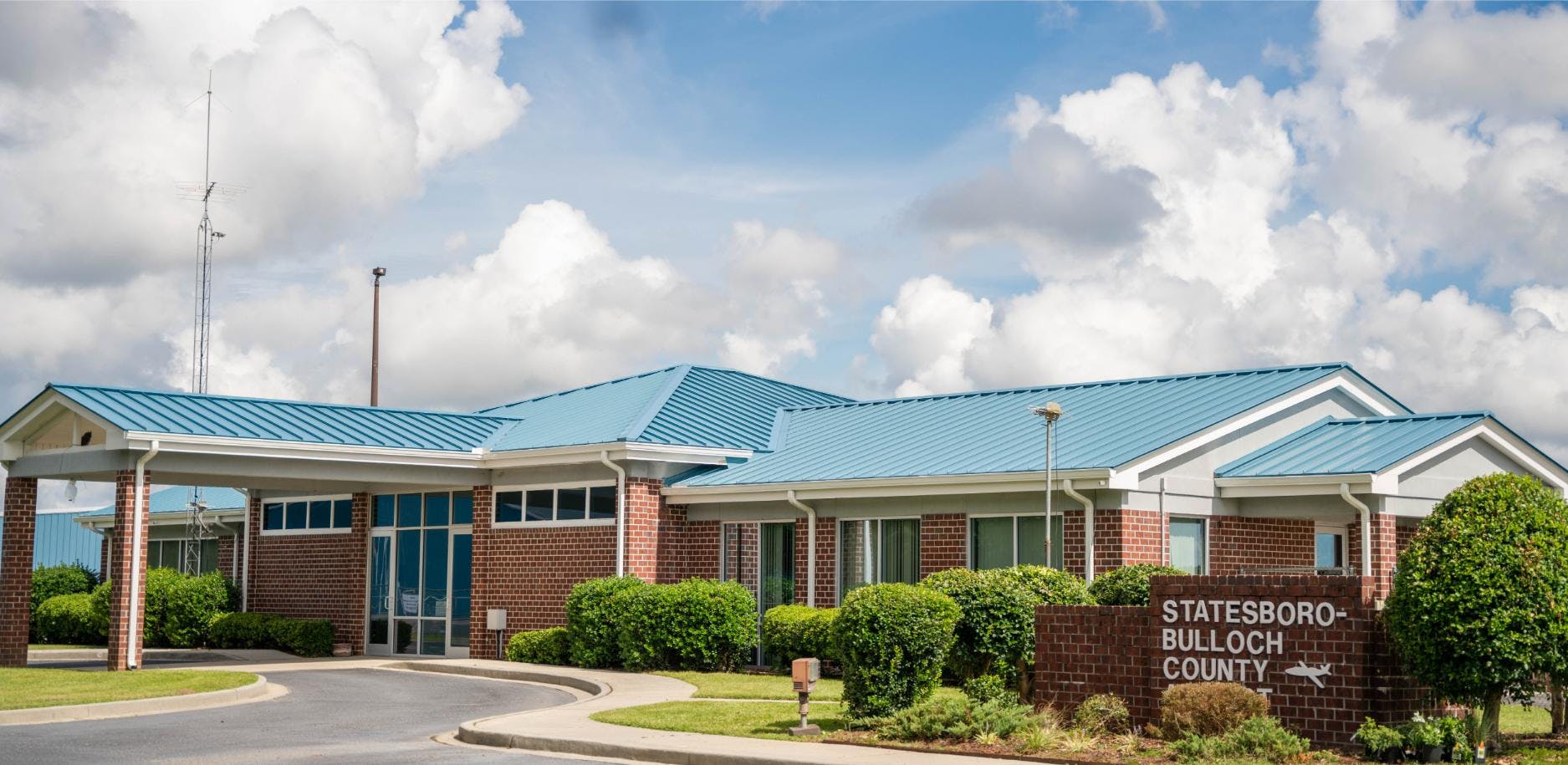 Statesboro-Bulloch County Airport | Commercial Roof Replacement | Bulloch County Commercial Roofers | Standing Seam Metal Roofing | Blue Roof | Commercial Metal Roof